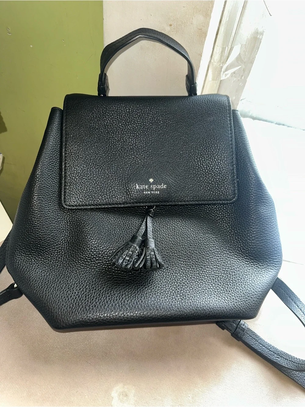 Kate Spade Black Pebbled Leather Tassel Backpack